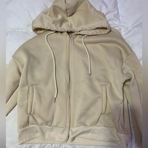half zip up. beige colored. kids or women’s